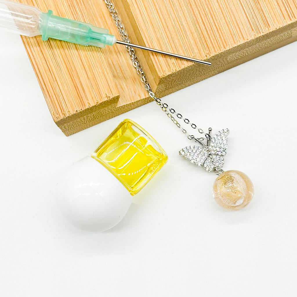 Sterling Silver Diamond Butterfly Aroma Necklace - Pink | Energy & Healing | Diffuse on the go